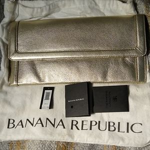 Banana Republic gold leather clutch never used
